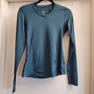 REI sport top with abstract pattern on the sleeve